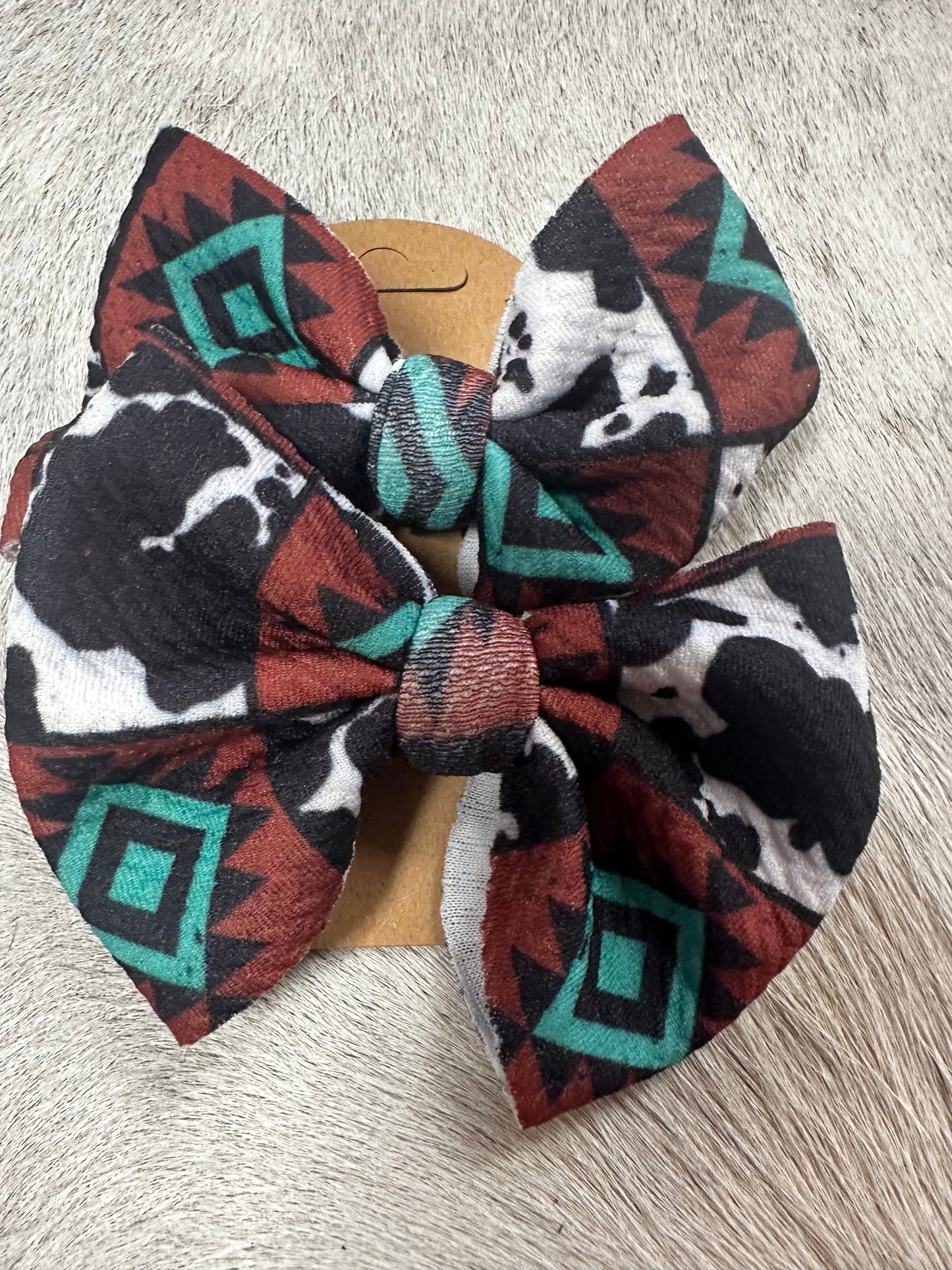 Turquoise Cow Print Bows