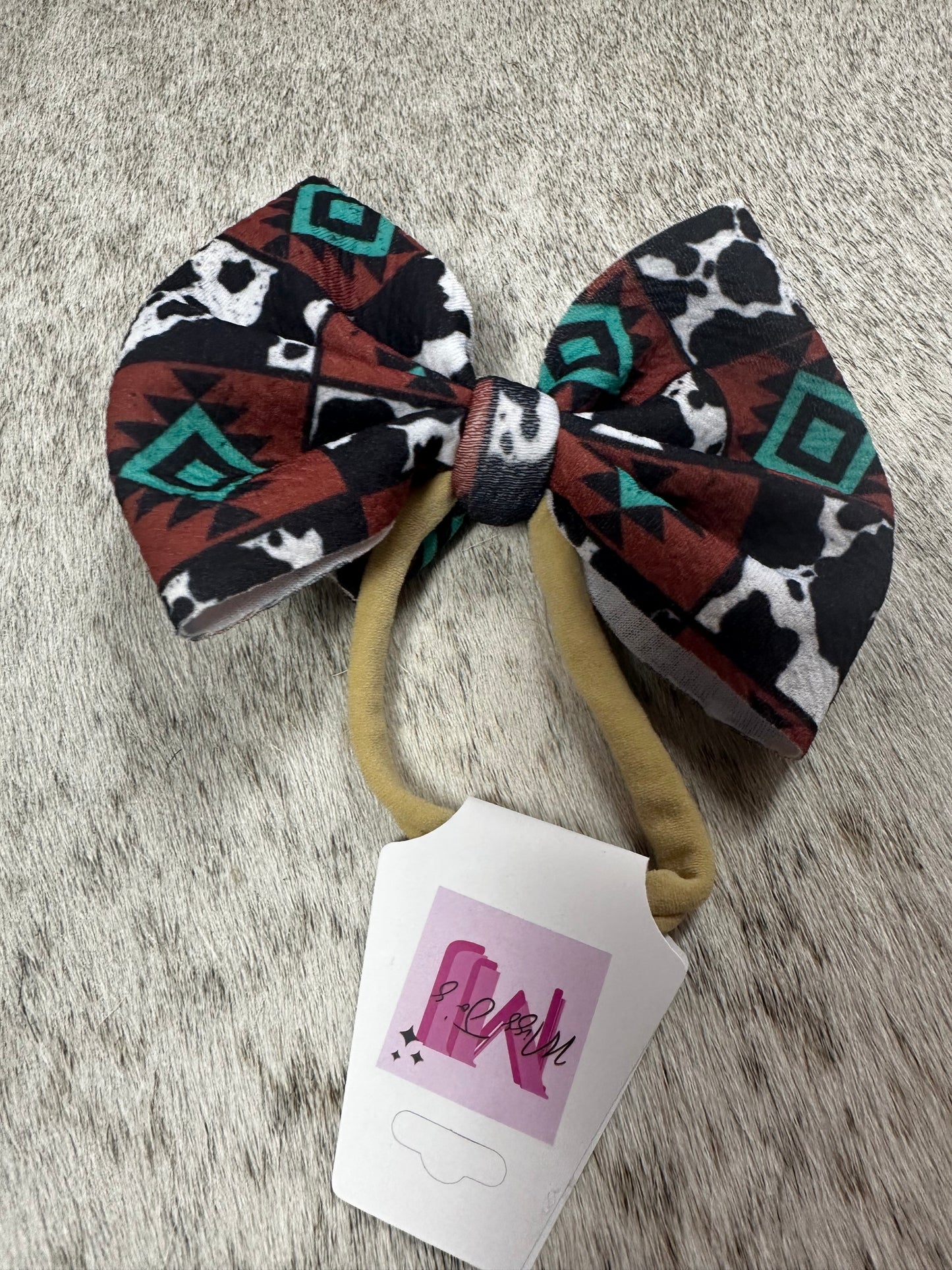 Turquoise Cow Print Bows